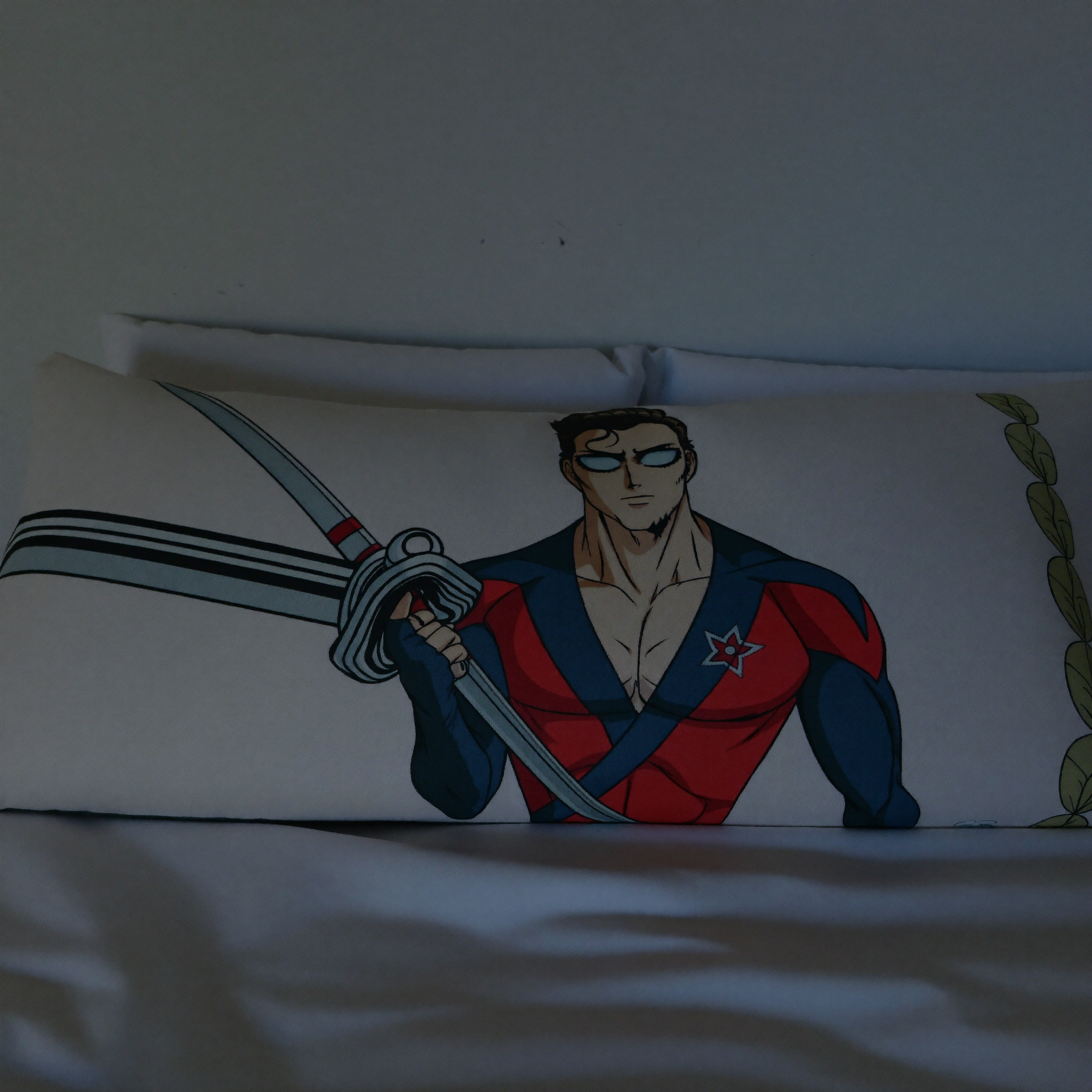 Rev Hunter body pillow on bed